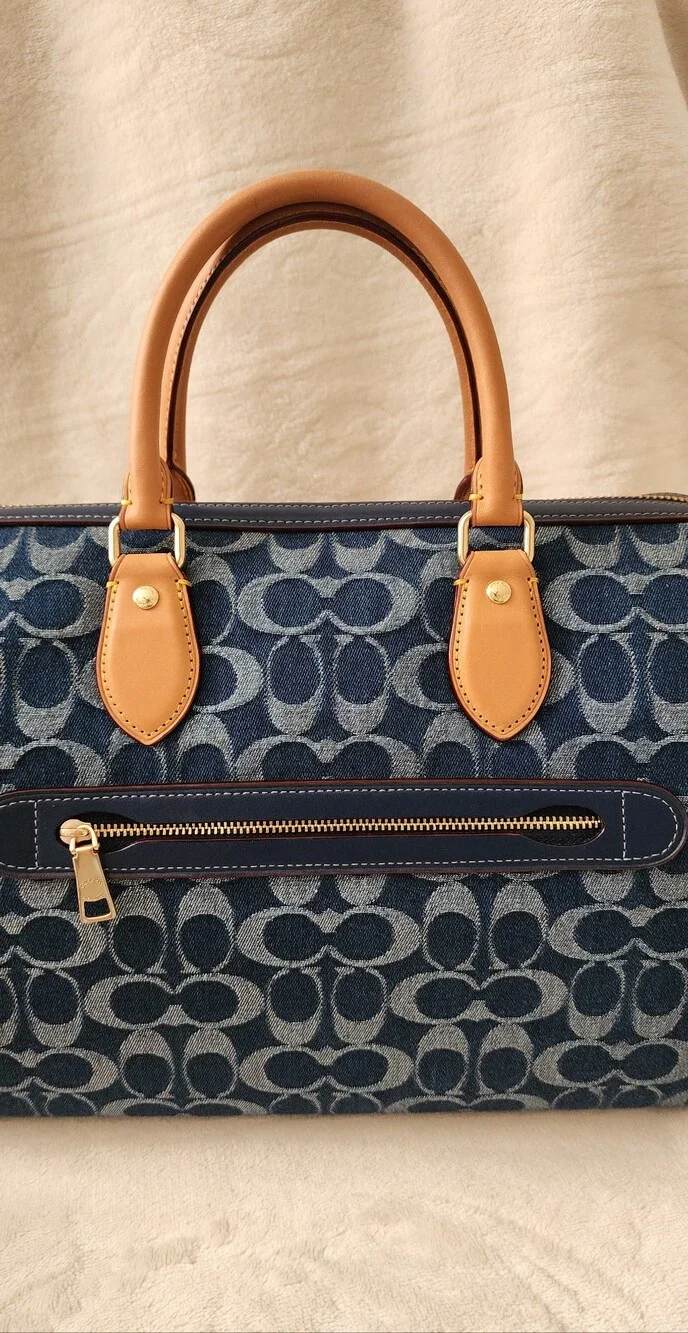 Coach dark signature